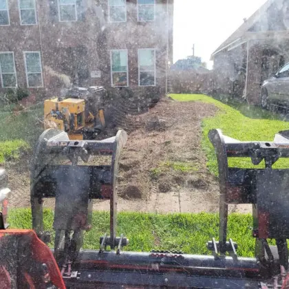 Stump grinding equipment on residential lot