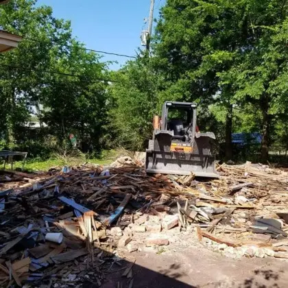 Structure demolition and debris cleanup